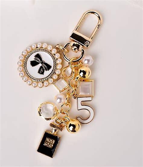 chanel keys|Chanel fluffy keychain.